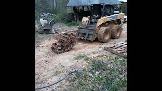 John Deere tracks over wheels installation 328 325 How to install loegering skid steer tracks [upl. by Carolyn910]