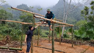 Despite the pouring rain the militiaman still worked hard to help the orphan boy build a new house [upl. by Guthrey]