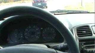 1999 Mazda Protege cold start and drive [upl. by Gittle]