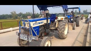 स्वराज 744 and POWERTRAC euro 52 next tractor race Khet levelling Karya farming videos [upl. by Ahsatel]