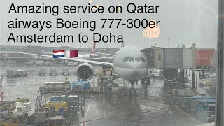 TRIP REPORT Qatar Airways Amsterdam to Doha Boeing 777300erEconomy [upl. by Norramic492]