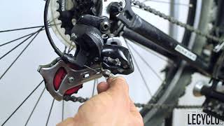 Comment régler un dérailleur arrière de vélo [upl. by Oiliruam]