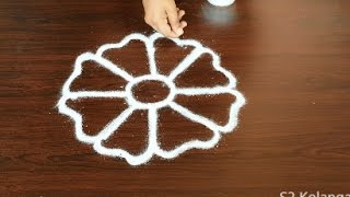 freehand flower rangoli designs  easy freehand kolam  simple flower muggulu designs [upl. by Skell]