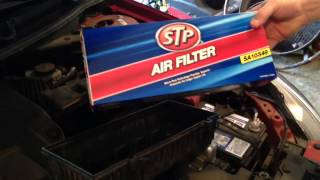 Changing the air filter on a Nissan Altima By Howto Bob [upl. by Rybma]