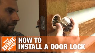 How to Install a Door Lock  The Home Depot [upl. by Yrffoeg850]