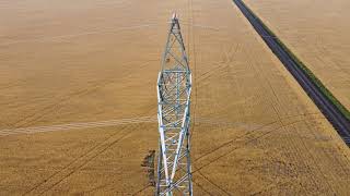 Flyby of a Manitoba Hydro HVDC lattice self supporting transmission structure [upl. by Einnaej]