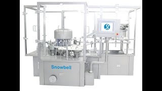 Snowbell  PFS Filling Stoppering with plunger Rod Insertion amp Labelling Machine [upl. by Harding]