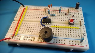 Doorbell circuit using 555 timer  Breadboard projects [upl. by Refitsirhc]