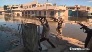 Libya fighters continue battle against proGaddafi resistance [upl. by Kraft]