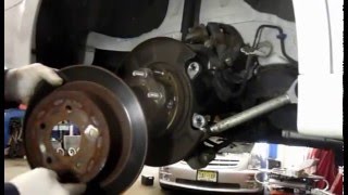 How to replace front and rear brakes on a 2008 Nissan Altima [upl. by Comptom446]