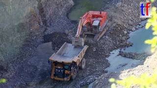 Hitachi Zaxis 870LCH amp CAT 775G in a Quarry  Steinbruch 08092016 [upl. by Enyahs47]