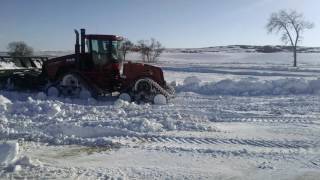 485 Quadtrac pushing snow [upl. by Hannover448]