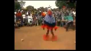 A dancing man on a stick  amazing african tribal dance  Zaouli Dance [upl. by Brunell]