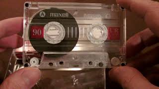 Unwrapping a Maxell UR90 audio cassette [upl. by Jarvey463]