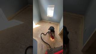 Using the Milwaukee M18 belt sander to smooth subfloor seams ahead of LVP install [upl. by Morganica25]