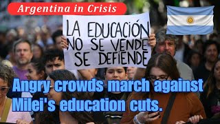 Students and teachers across Argentina march in protest at cuts to universities [upl. by Weatherby213]