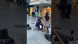 Didgeridoo busker is atraditional Australian Aboriginal in Adelaide city ភ្លេង​ជនជាតិដើម​អូស្ត្រាលី [upl. by Edrahs120]