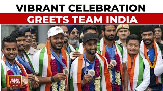 Garlands amp Dhol Indian Hockey Team Gets Grand Welcome After Bronze Victory In Paris Olympics [upl. by Fitzhugh]