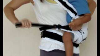 Manduca Baby Carrier Instructions  Switching from Cross Strap Front Carry to Hip Carry [upl. by Anairotciv586]