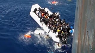 Migrants Flee Sinking Dinghy in Dramatic Footage [upl. by Groh651]