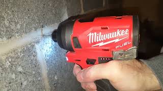 Attaching wood to a concrete wall with a Milwaukee M2 hammer drill  2x4 furring strips etc [upl. by Hawger]