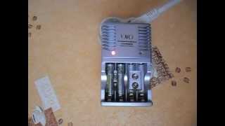 Зарядное устройство UFO KN990A Battery charger UFO KN990A [upl. by Nohsauq]