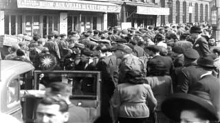 Group of American and British prisoners are marched through streets under German HD Stock Footage [upl. by Evot]