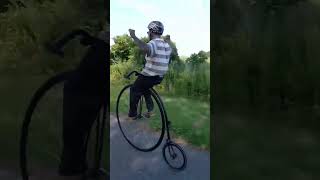 Penny farthing high wheel unicycles unicycling mike arotsky sings superman [upl. by Divadnhoj]