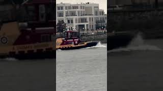 Tugboat sails down Mississippi River past French Quarter in New Orleans neworleans tugboat river [upl. by Ahsatel]