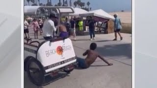 Venice pedicab driver breaks up fight by driving his bike into brawl [upl. by Leoy415]