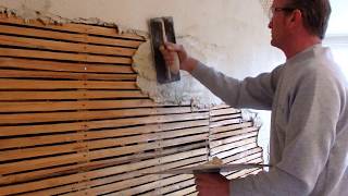 Traditional Lime plaster on laths first coat of lime plaster onto a lathed wall in Kent  2018 [upl. by Lexis]