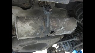 93 Volvo 940 rotted out muffler replacement with surprise inside quotnewquot unit [upl. by Allayne]