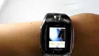 M810 M801 WATCH MOBILE PHONE CAMERA TRIBAND [upl. by Devinna570]