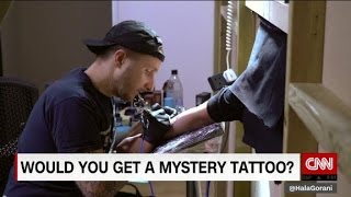 Famed tattoo artist gives away free mystery tattoos [upl. by Llehsam110]