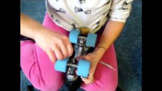 Roller Derby How to Change Your Roller Skate Bushings [upl. by Attekahs]