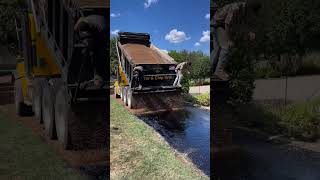 Nothing beats some brown pea gravel 🤩  🎥 southernsunpaving9979 asphaltpavement construction [upl. by Saeger]