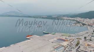 Igoumenitsa Greece Lefkimmi Lines ferry moored to the dock for unloading Stable Aerial View [upl. by Ojeitak]