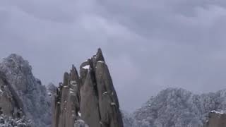 E Chinas Huangshan Mountain witnesses first snowfall of the year [upl. by Outlaw817]