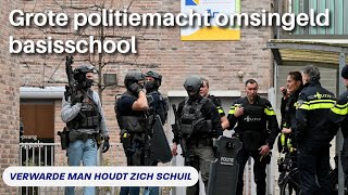 Verwarde man dringt basisschool binnen politie massaal aanwezig [upl. by Eladnyl]