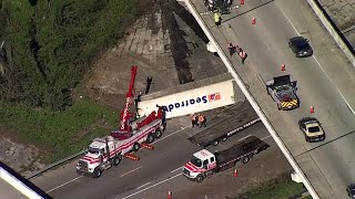 Part of semitruck falls off I75 onto Hillsborough Avenue [upl. by Hgiellek124]