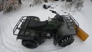 Plowing snow with a Honda fourtrax 300 4x4 atv [upl. by Ytnom545]