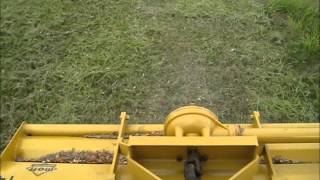 Mowing with an older Mott flail mower on a John Deere 2020 [upl. by Phare]