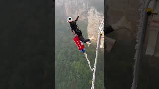 Zhangjiajie Grand Canyon Glass Bridge Bungee Jump [upl. by Burdelle]