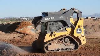 Deere 317G Building House Pad [upl. by Aneek705]