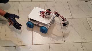 Arduino based Hand Gesture Controlled Robot with Robotic arm [upl. by Eiramnerual]