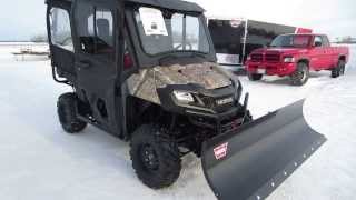 2014 Honda Pioneer 7004 with Workman Cab 72quot Warn Blade and 4000lb Warn winch Sold [upl. by Yrahk]