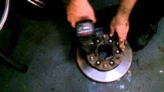 Nissan Pathfinder 1996 to 2004 Front Rotor Removal to replace Brake Rotor [upl. by Airrat406]