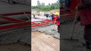 Concrete paving process with the road roller [upl. by Florinda]