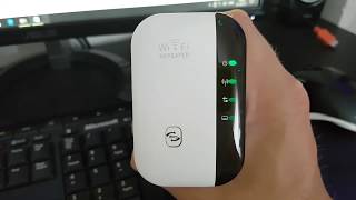 Wifi Repeater 300Mbps Signal Extender Booster Review Setup [upl. by Nosidam]