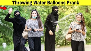 Throwing Ice Water Balloons at Peoples Prank  Hit Pranks ​ [upl. by Burhans633]